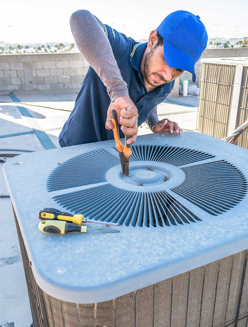 heat-pump-repair by Rialto HVAC technician
